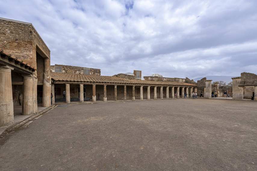 Corner view of the courtyard with columns of the Stabian Baths