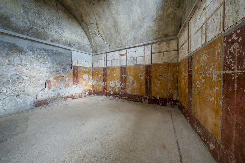 Interior frescoes in an apsidal hall of the Forum Baths of Pompeii