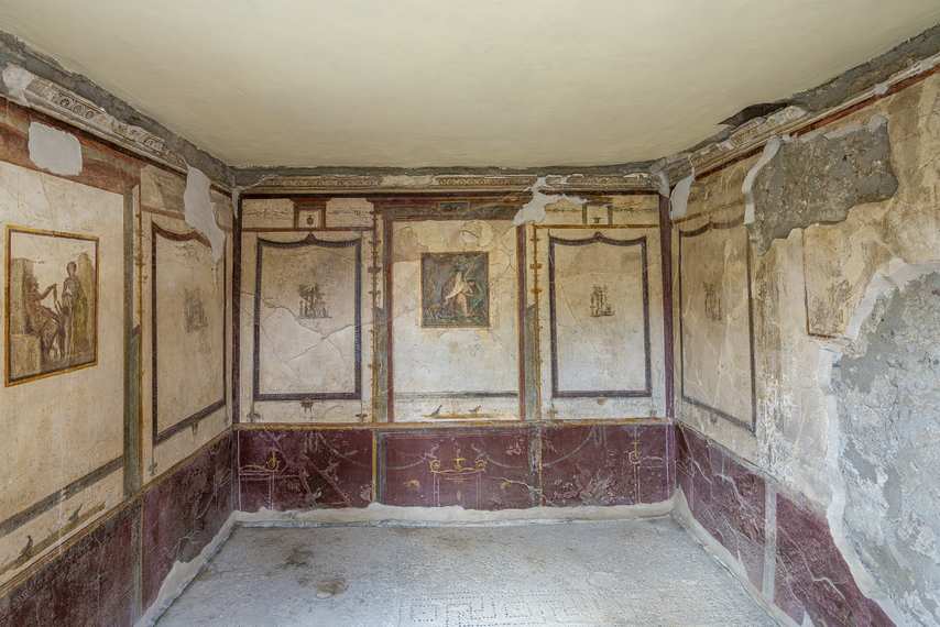 Decorative frescoes in an interior room of the House of the Dioscuri in Pompeii