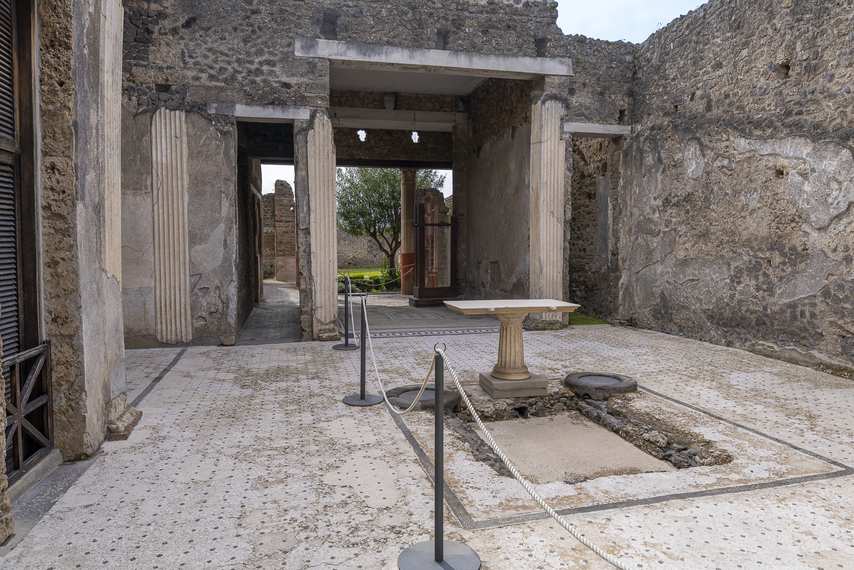 Atrium of the Orchard House in Pompeii with impluvium and stone columns