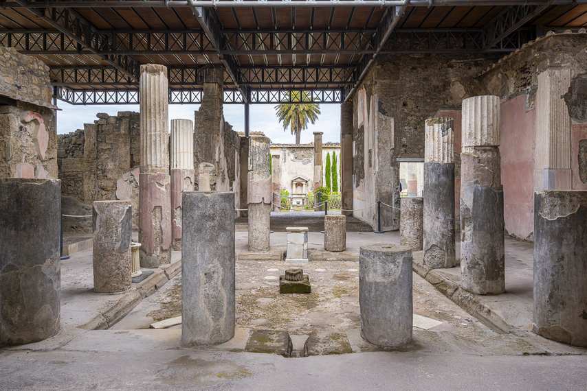 Atrium columns overlooking the garden of the House of Dioscuri in Pompeii