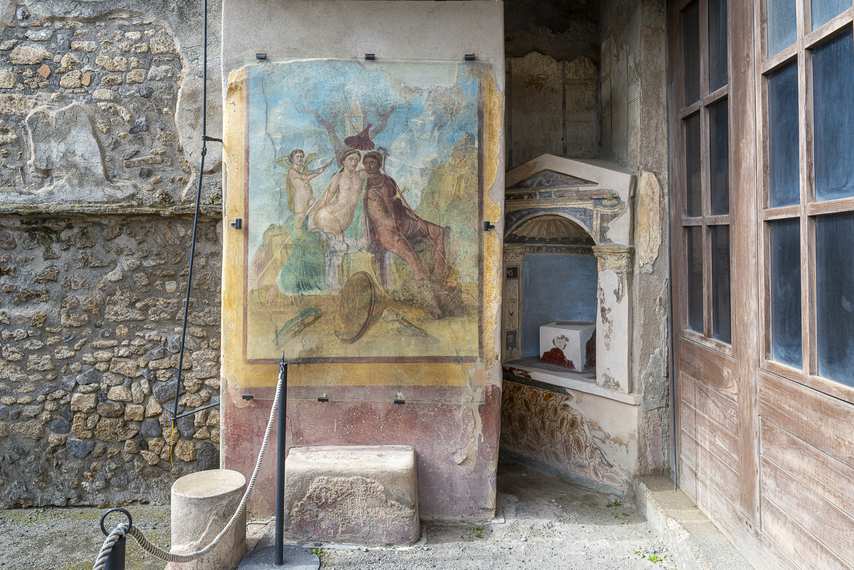 Fresco with mythological scene and painted lararium in the House of Ephebus in Pompeii