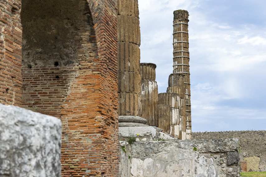 Close-up detail of the columns and arch of the Temple of Jupiter in Pompeii