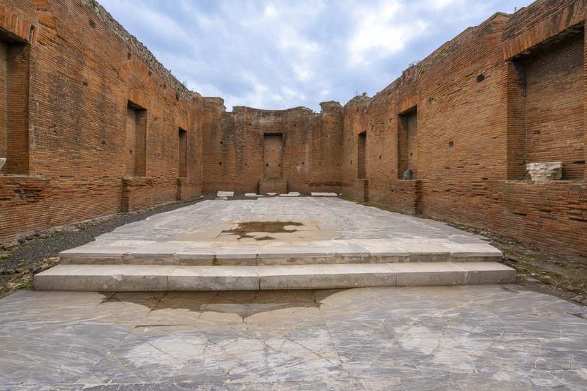 Ancient comitium and remains of Pompeii's Municipal Buildings with marble flooring