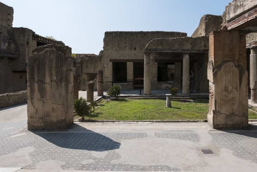 Inner courtyard with columns and garden among the ruins of ancient Herculaneum