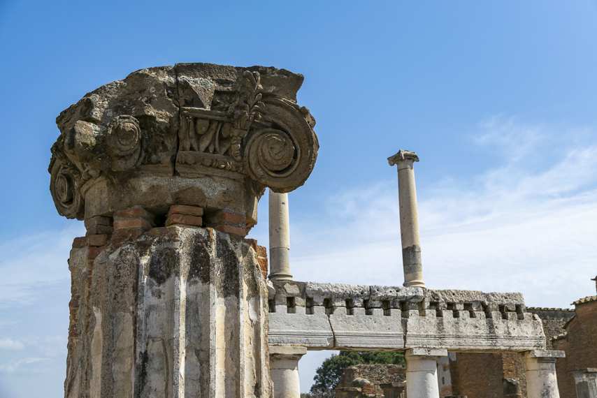 Detail of a column with an Ionic capital in the Forum of Pompeii