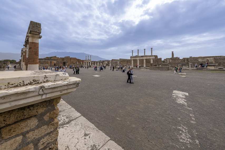 General view of the Forum of Pompeii with columns and cloudy sky