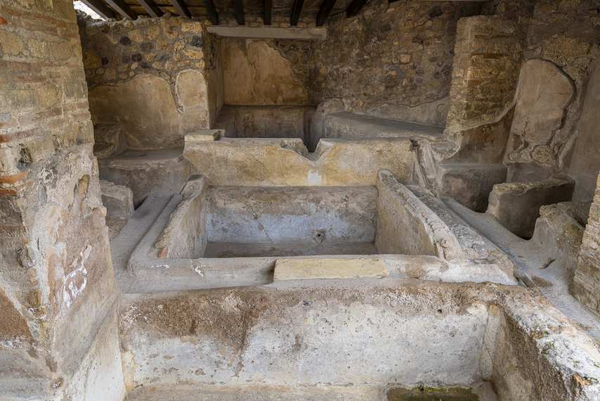 Masonry tubs for washing textiles in the Fullonica of Stephanus at Pompeii