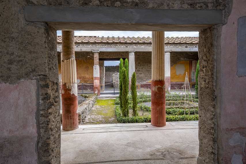 View of the colonnaded garden of the House of the Dioscuri in Pompeii