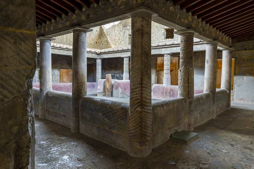 Central impluvium surrounded by frescoed columns in the Villa of Poppaea at Oplontis