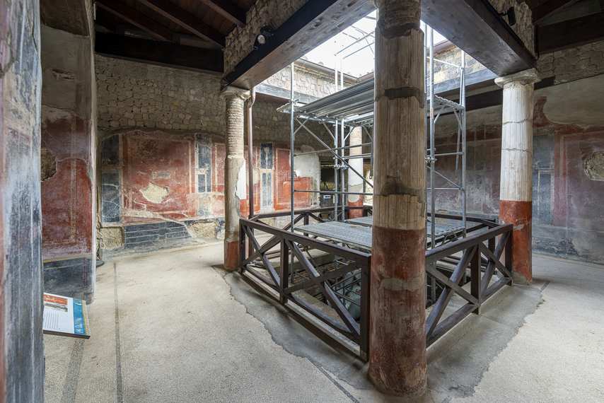 Impluvium under restoration in the Villa San Marco at Stabiae with frescoed columns