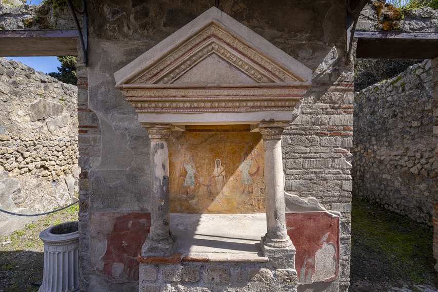 Lararium with sacred fresco in the House of the Red Walls in Pompeii