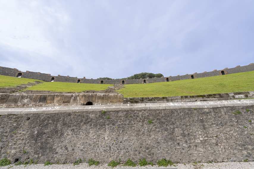 Close-up view of the walls and steps of the Amphitheatre of Pompeii.