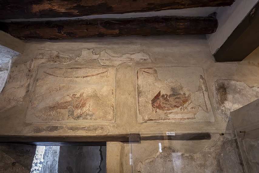 Erotic frescoes near the ceiling of the Lupanar of Pompeii