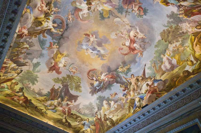 Baroque ceiling fresco in the Royal Palace of Caserta with mythological scenes and celestial figures
